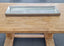 Elegant silver mirror tray with a luxe beaded frame.